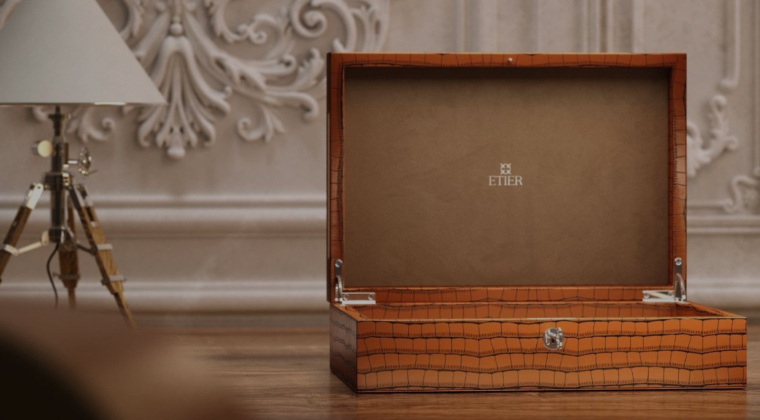 Open crocodile-embossed leather watch case showcasing refined interior craftsmanship