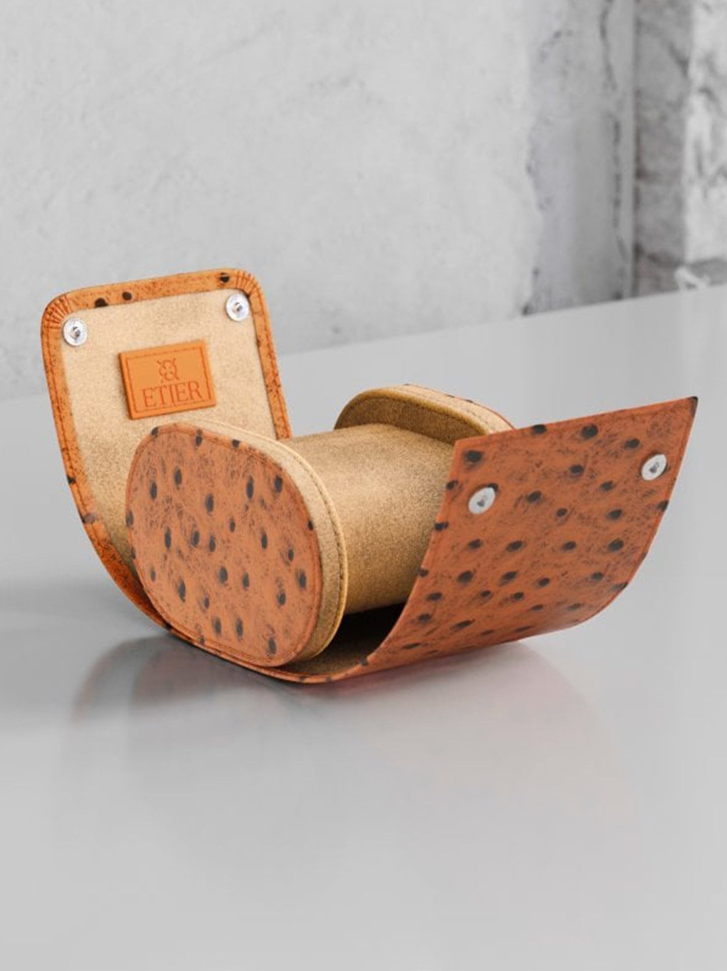 Handcrafted ostrich leather watch roll providing elegant and protective watch storage for travel and everyday use