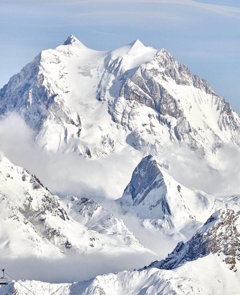 Snow-covered Alpine mountain peaks overlooking Courchevel