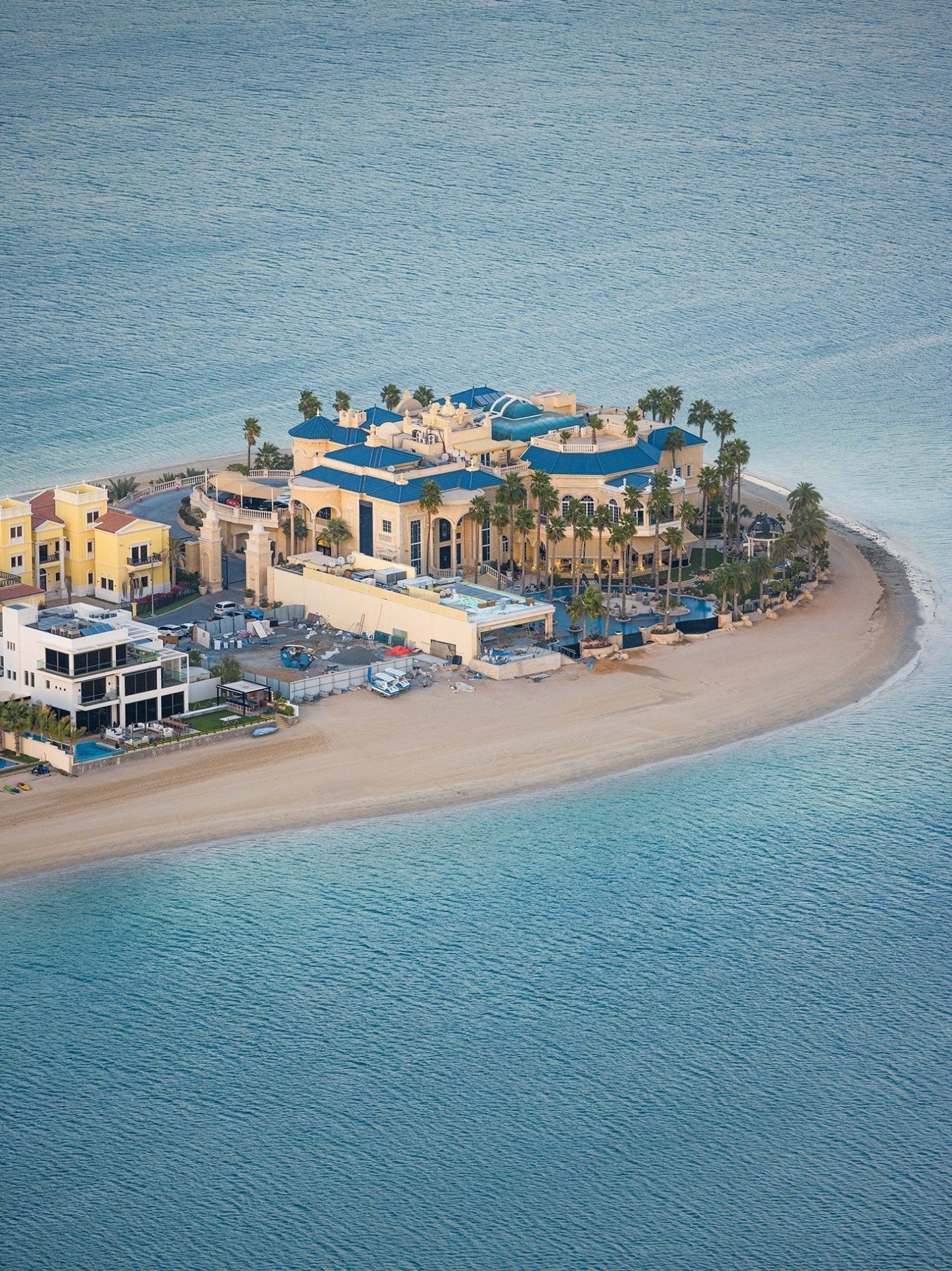 Luxury waterfront residences and resorts on The Palm Jumeirah Dubai set along calm coastal waters