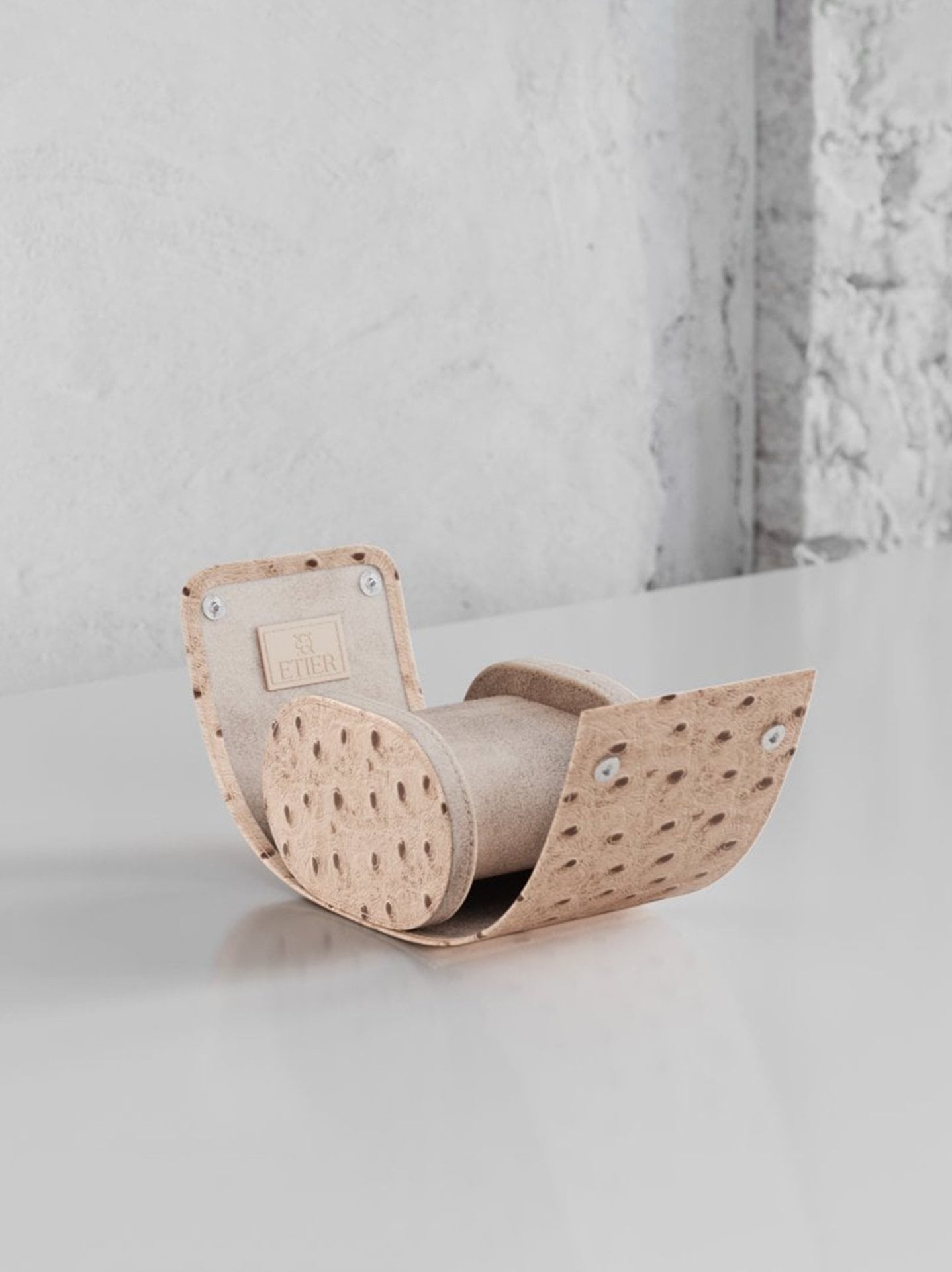 Minimalist ostrich leather watch roll designed for elegant and protective watch storage